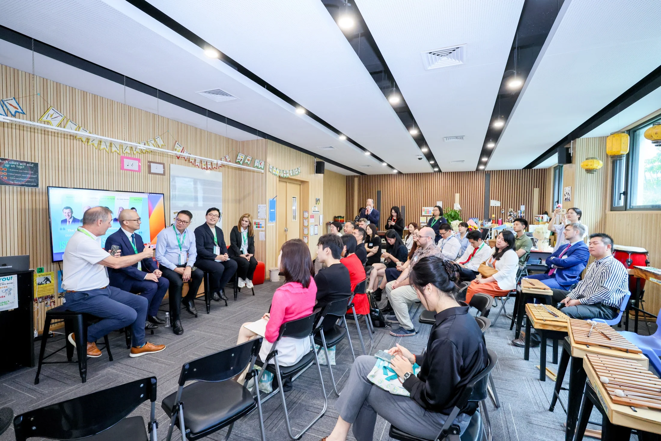 International school leaders attending an Infocare education technology discussion